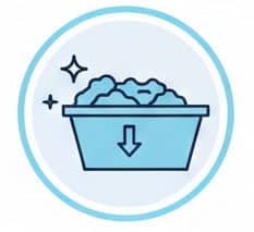 Laundry basket filled with clean clothes and sparkles, with a downward arrow indicating washing or drying process.